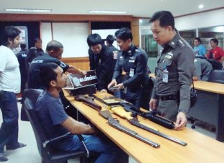 Police have arrested alleged gun repairman Surachit Wirojwong and confiscated a cache of weapons, but so far no charges have been filed.